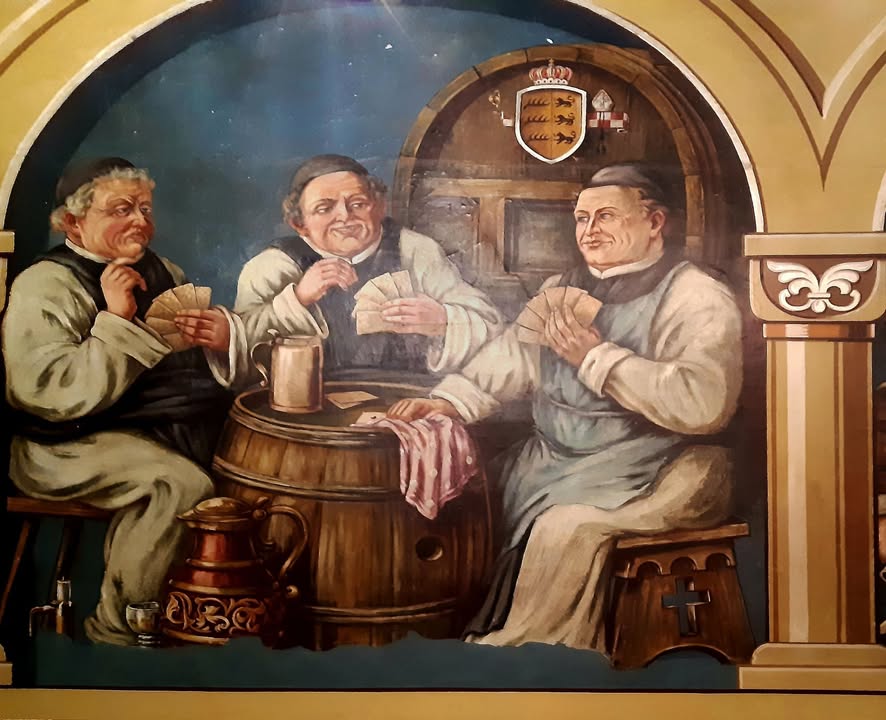 Wirtshausgäste bei Bier und Kartenspiel, Wandmalerei, Ausschnitt. Abb. in Kloster Maulbronn, Infozentrum. Foto: Staatliche Schlösser und Gärten, Petra Mohr